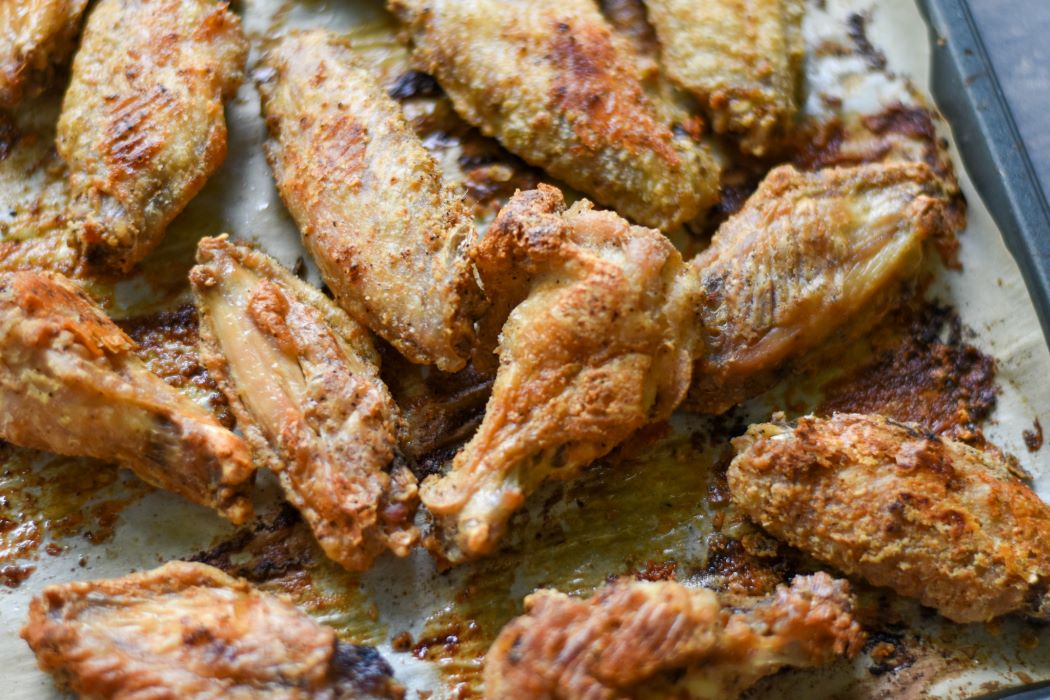 oven fried chicken wings on baking sheet