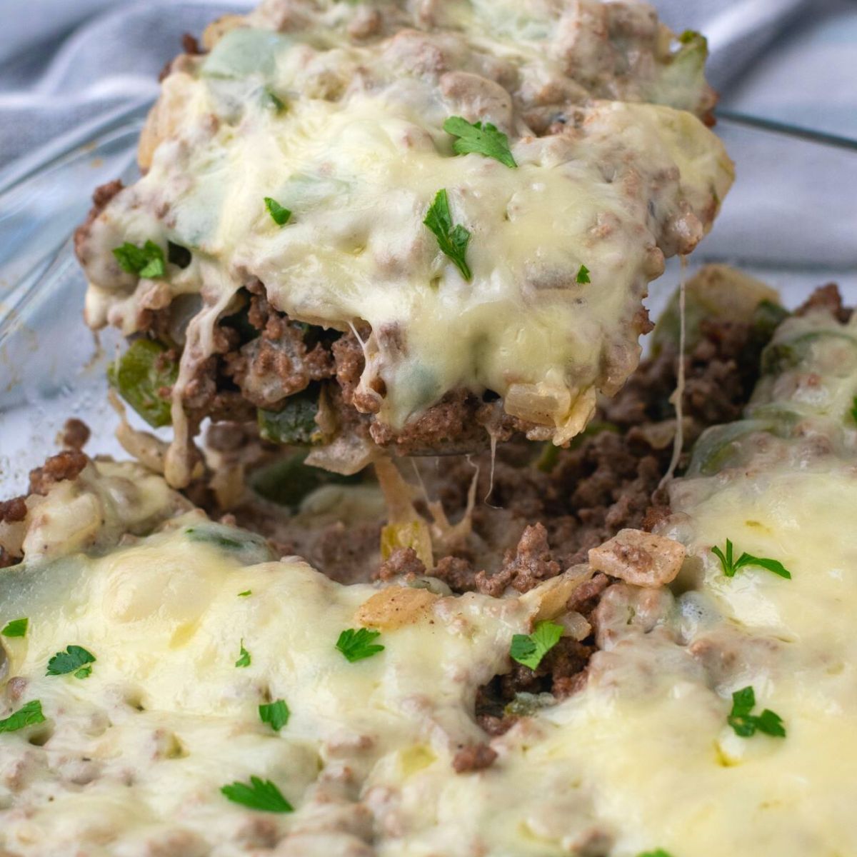 https://curbingcarbs.com/wp-content/uploads/2022/07/philly-cheesesteak-casserole-1.jpg