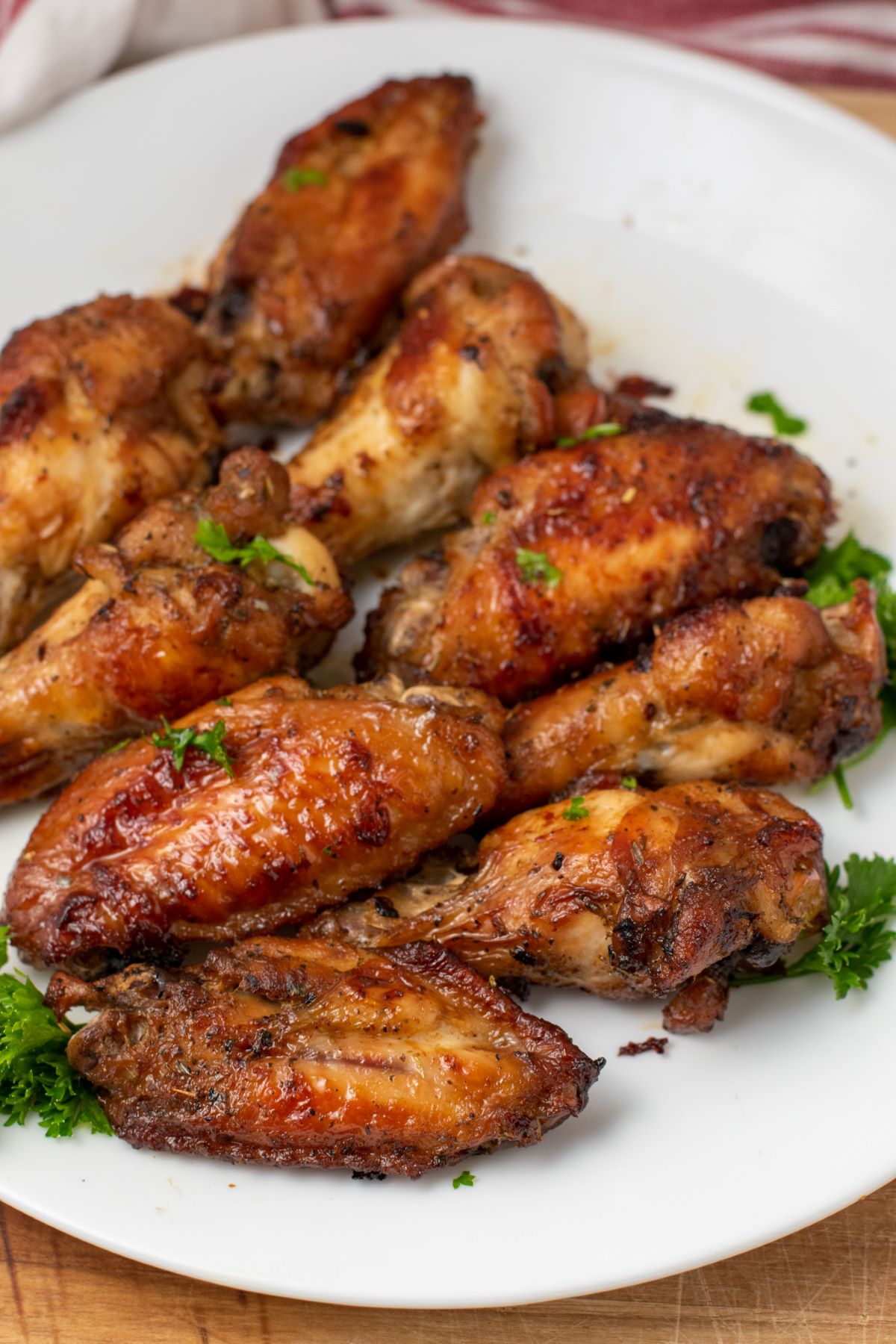 cooked chicken wings on white plate
